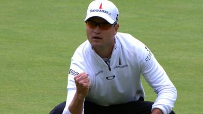 Zach Johnson celebrates his birdie at the 18th