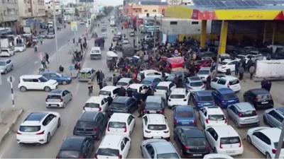 Cars lining up outside a petrol station in Gaza