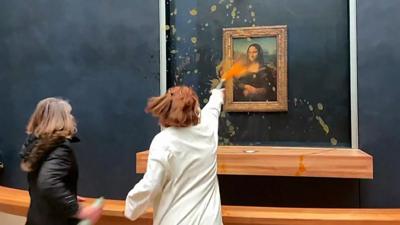 Protesters throw soup at Mona Lisa