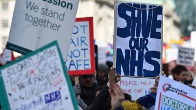 'Save our NHS' signs