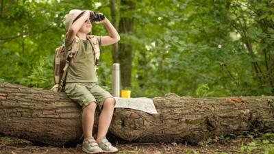 Girl guide looking at