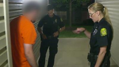 Police officers with suspect