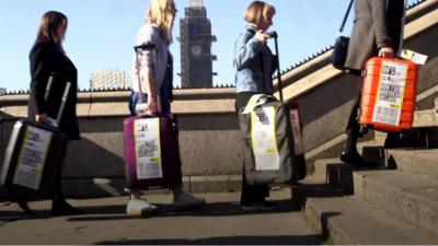 Women with suitcases