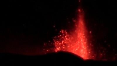 Lava spews from Mount Etna