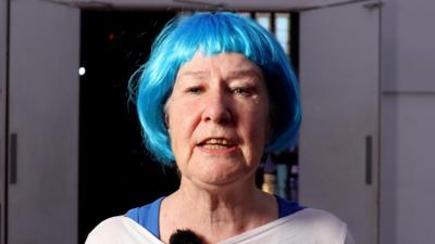 Woman in blue wig