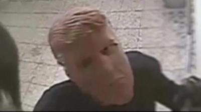 Suspected robber in Donald Trump mask