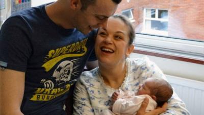 Hannah with her husband Robert and baby Esther