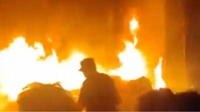 Protesters in front of fire