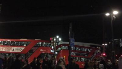 Buses in darkened Piccadilly Circus