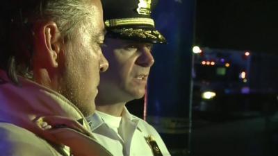 Assistant Police Chief Matt Carper talks to reporters after the Dayton shooting