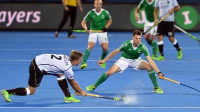 Germany's Mathias Muller competes against Ireland's Jonathan Bruton