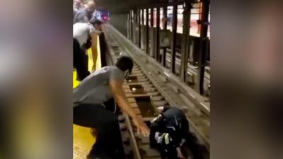 Rescue effort on NYC subway tracks