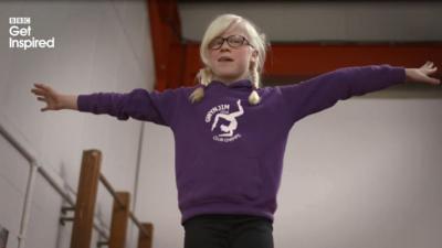 Blind girl in gymnastics class at Gwynjim in Bethesda, North Wales