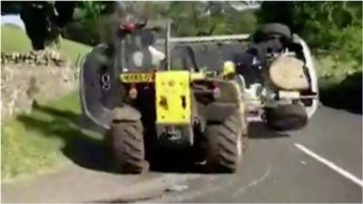 Robert Hooper denies dangerous driving and criminal damage after the incident on his farm driveway.