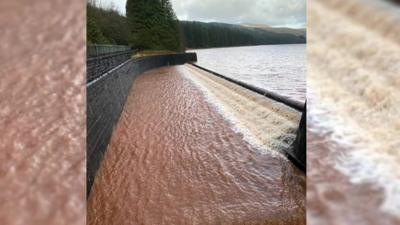 The landslides have turned the water a red colour