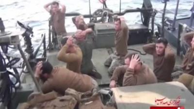 Still from video showing captured US Navy servicemen