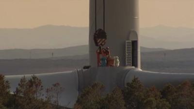 Man working on a wind turbine