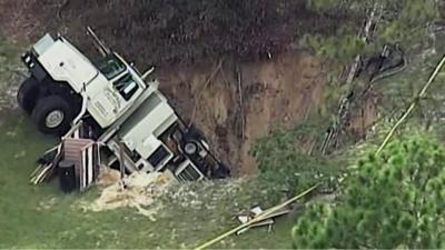 Sinkhole swallows truck