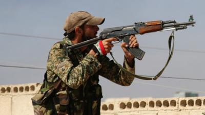 A Syrian soldier in Achan, Hama province, Syria, in October 2015