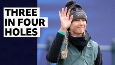 Nelly Korda waves to the fans