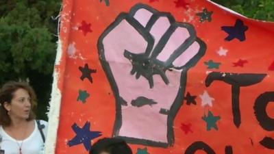 Fist image on protest sign