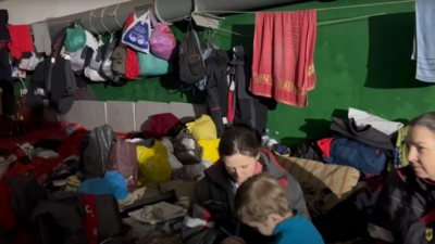 Women and children in an underground shelter in Azov's video