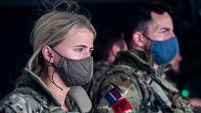 Two members of the UK Armed Forces' Military Police at Kabul airport, 23 August 2021