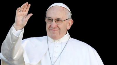 Pope Francis waves at the "Urbi et Orbi" message from Saint Peter's Basilica at the Vatican on 25 December 2018.