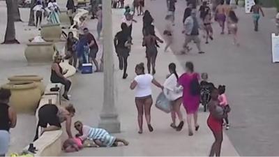 People running on Florida beachfront