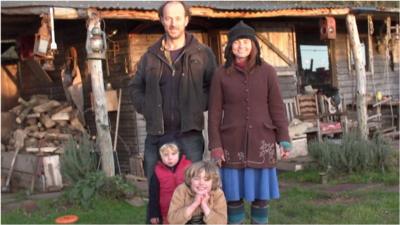 Barny, Katus and their children use a compost toilet and say their lifestyle is liberating.