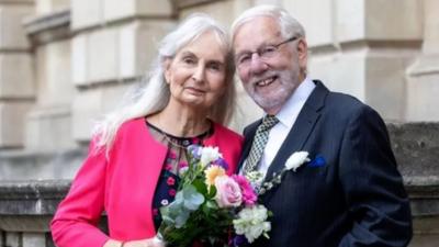 Newlyweds Christopher and Rosa after getting married