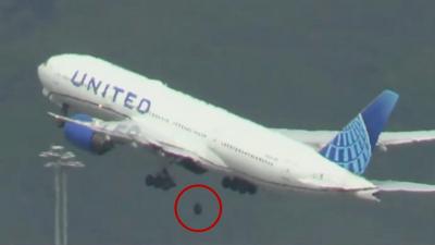 Plane with wheel falling off