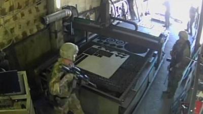 Troops mistakenly raid factory