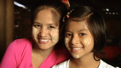 Mum and daughter wearing thanaka