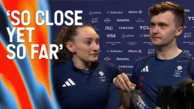 Jen Dodds and Bruce Mouat look disappointed in post game interview