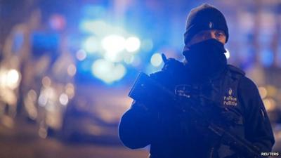 A masked Belgian police officer