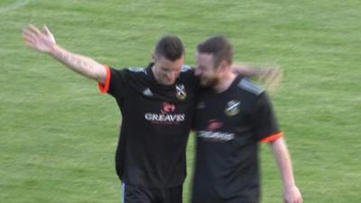 Tam Hanlon celebrates his hat-trick for Pollok Juniors