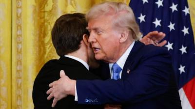 Image shows Trump and Macron