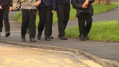 School pupils walking to school