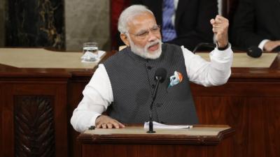 Indian Prime Minister Narendra Modi gestures as he addresses the US Congress