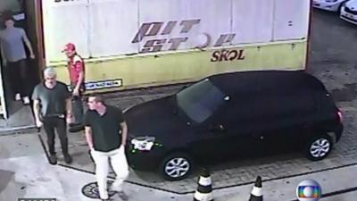 Still image from CCTV purports to show three US swimmers at a petrol station in Rio