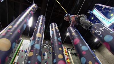 Child in climbing lesson