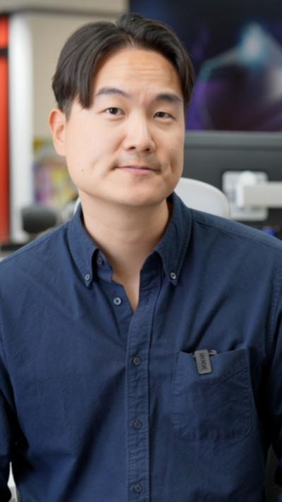 Jake Kwon wears a blue shirt