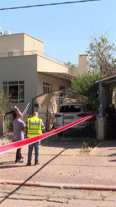 A cordon around a damaged house in Israel