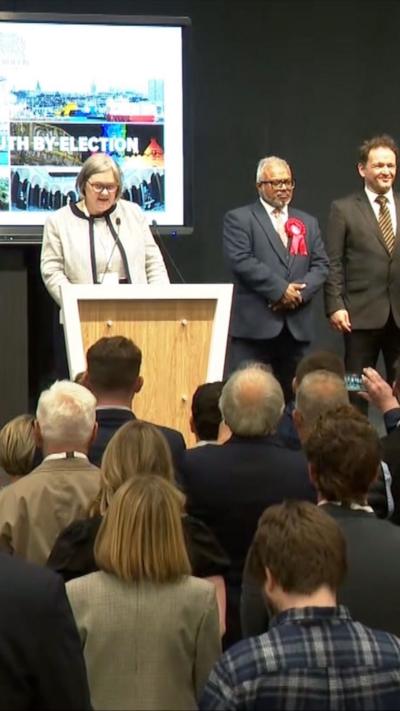 Candidates line up on stage as the result of Aberdeen South by-election is announced.