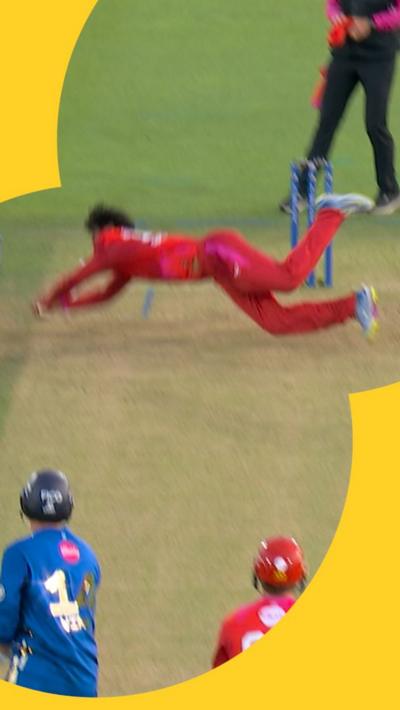 Rachin Ravindra dives in the crease to make an outstanding catch