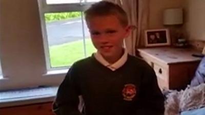 Northern Ireland fan Zak McGall receives a surprise birthday present from his father