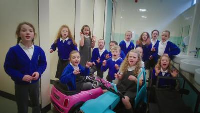 School pupils making video