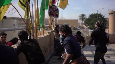 Protesters clash with security forces at the US embassy