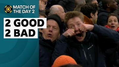 A Fulham fan taunting opposing supporters